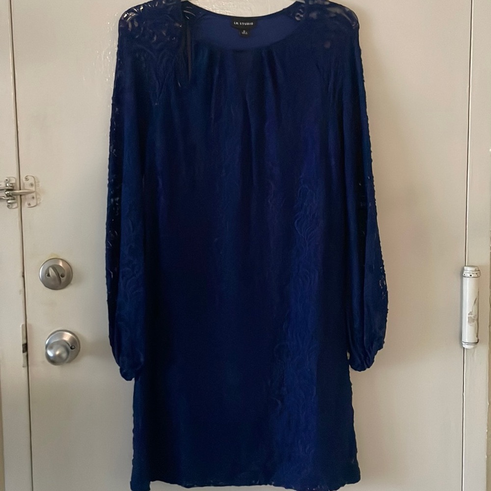 Women’s blue midi dress, lace top layer.